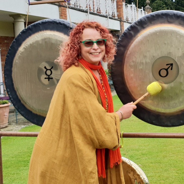Lara-playing-gongs